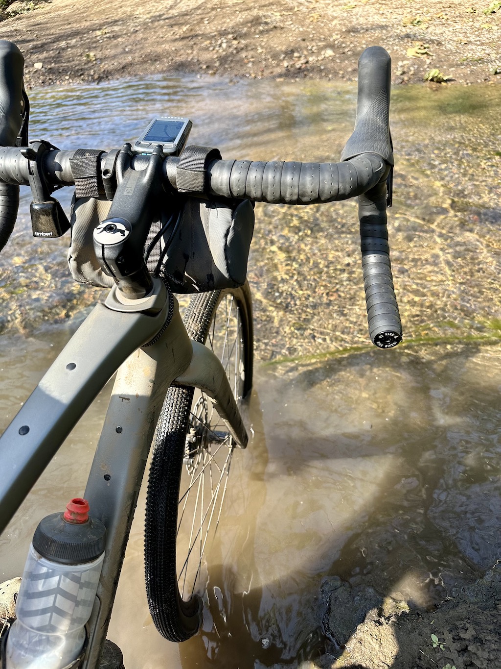 gravel bike in a few inches of water